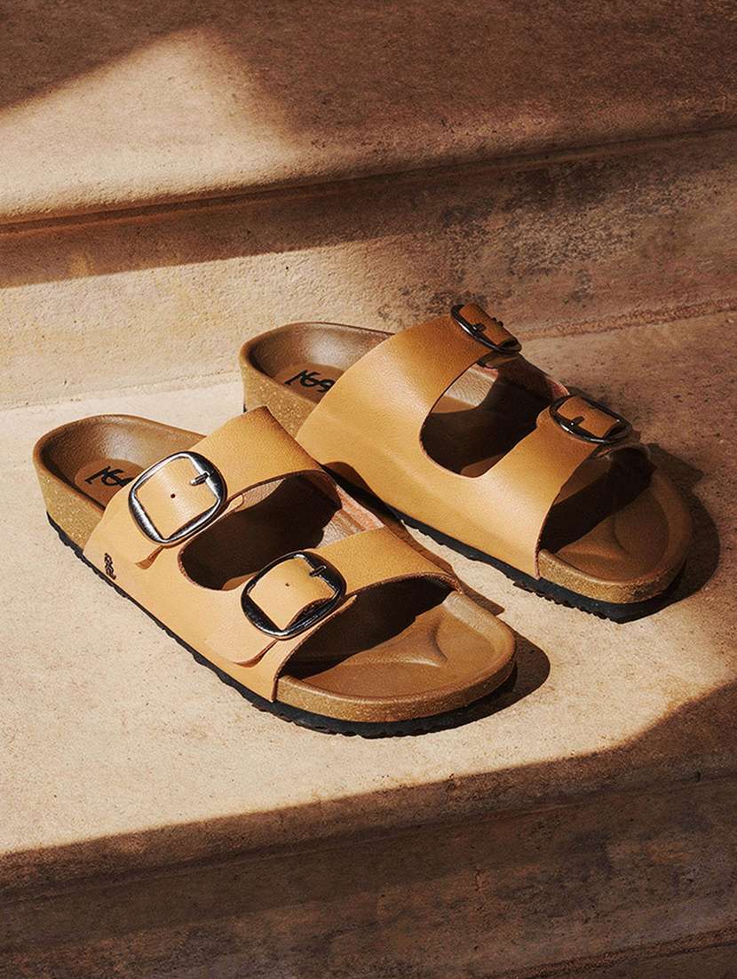 women tan slip on sandal