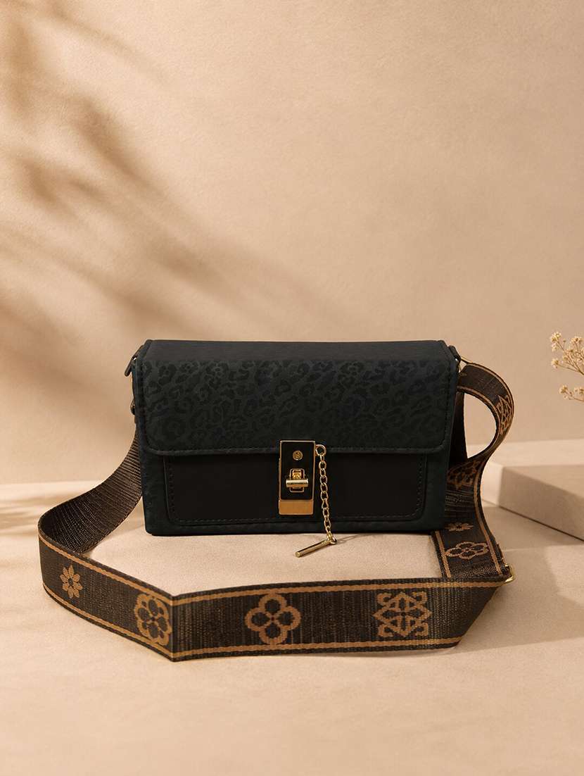 women black printed sling bag