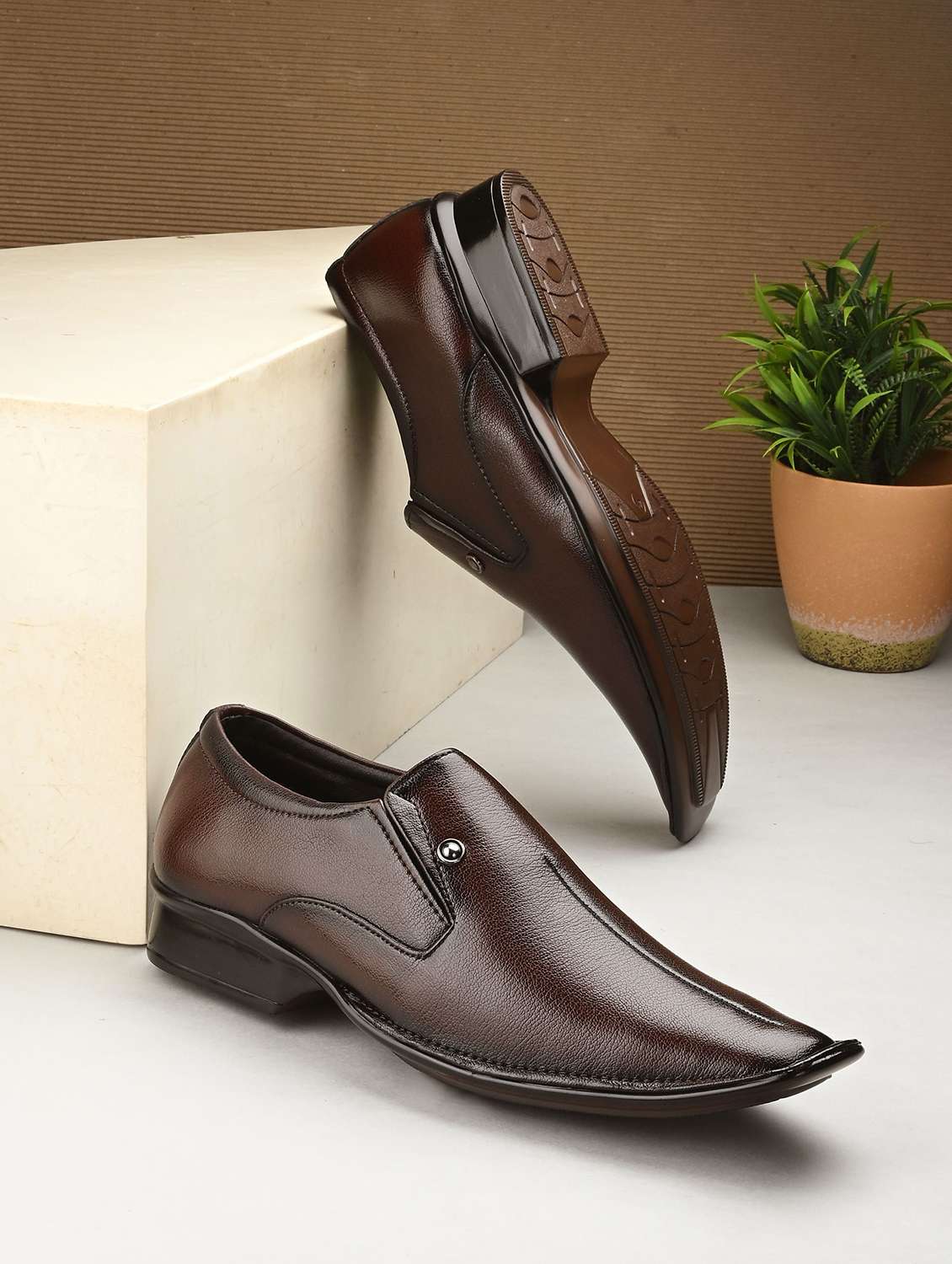 men brown slip on formal shoes