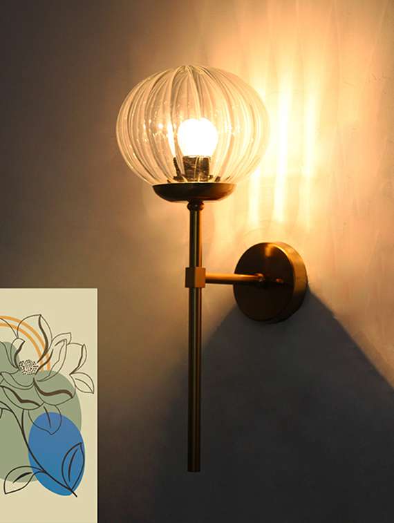 modern brass funner wall light clear kharbuja glass