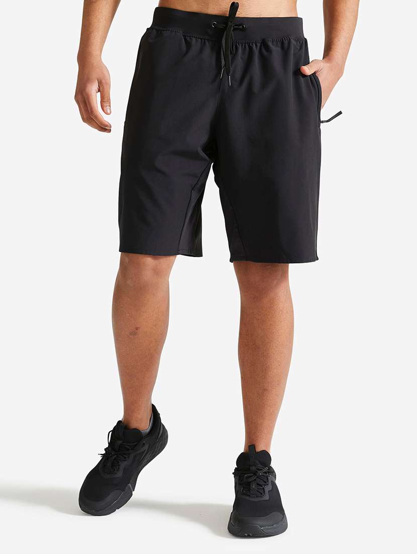 men solid mid rise regular fit sport shorts