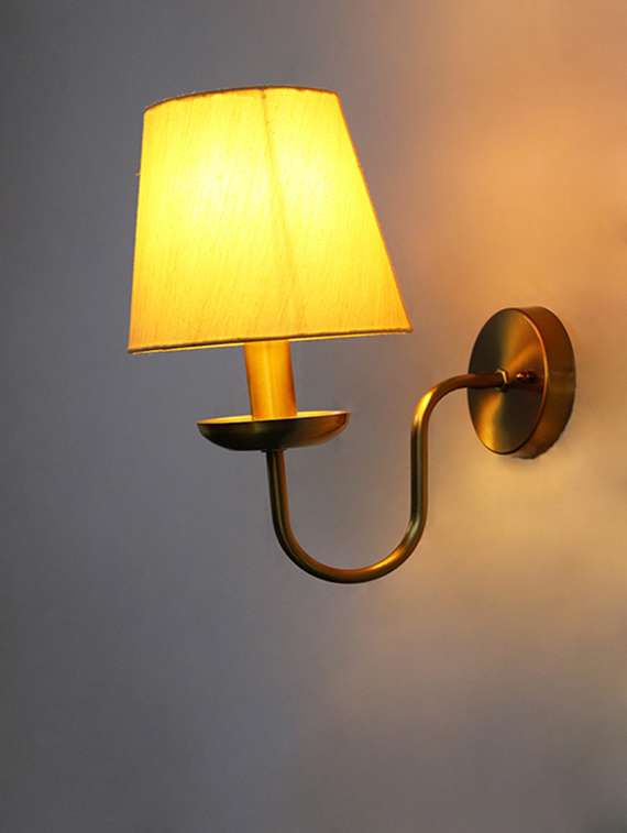 beige fabric shade wall lamp