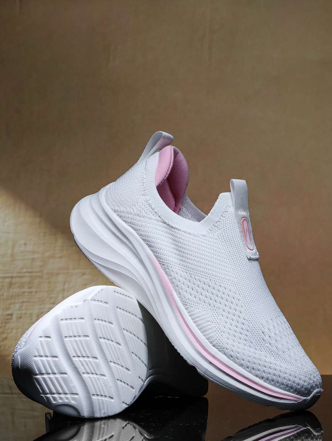 women self design slip on sports shoes