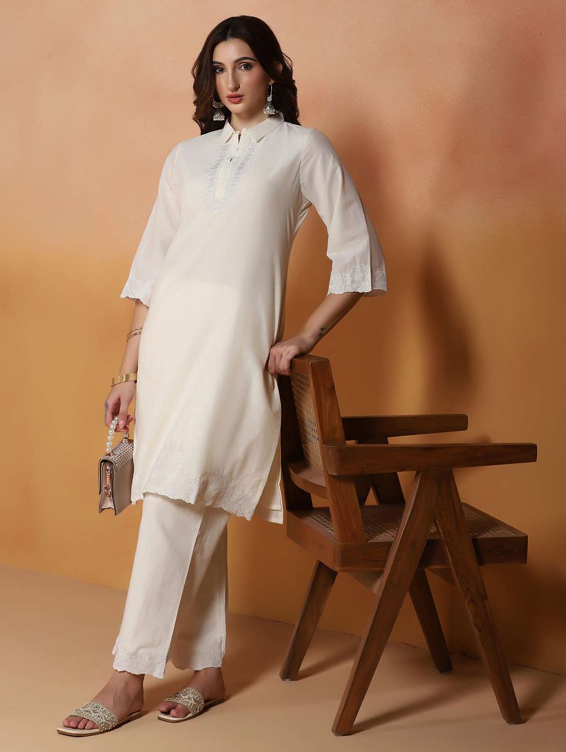 women embroidered three quarter sleeves kurta and pant set
