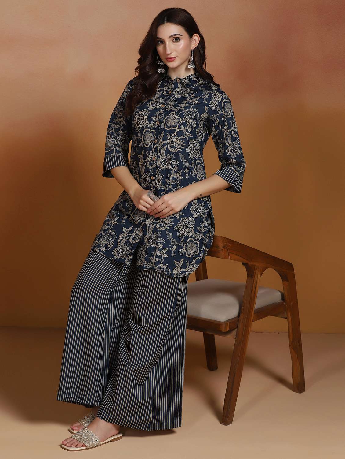 women printed three quarter sleeves kurta and palazzo set