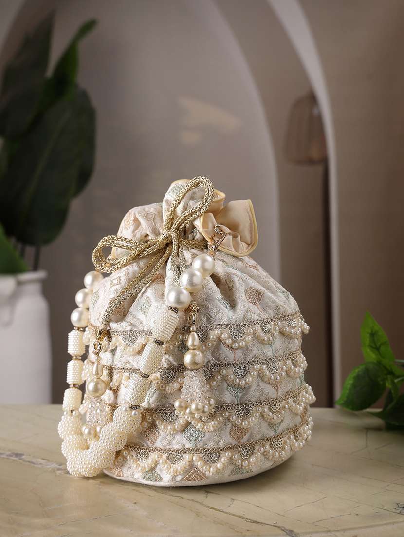 off white faux silk ethnic potli bag with drawstring closure