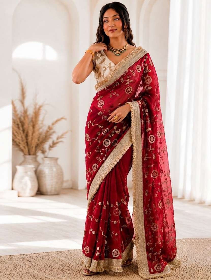 women solid with work embroidered saree with blouse