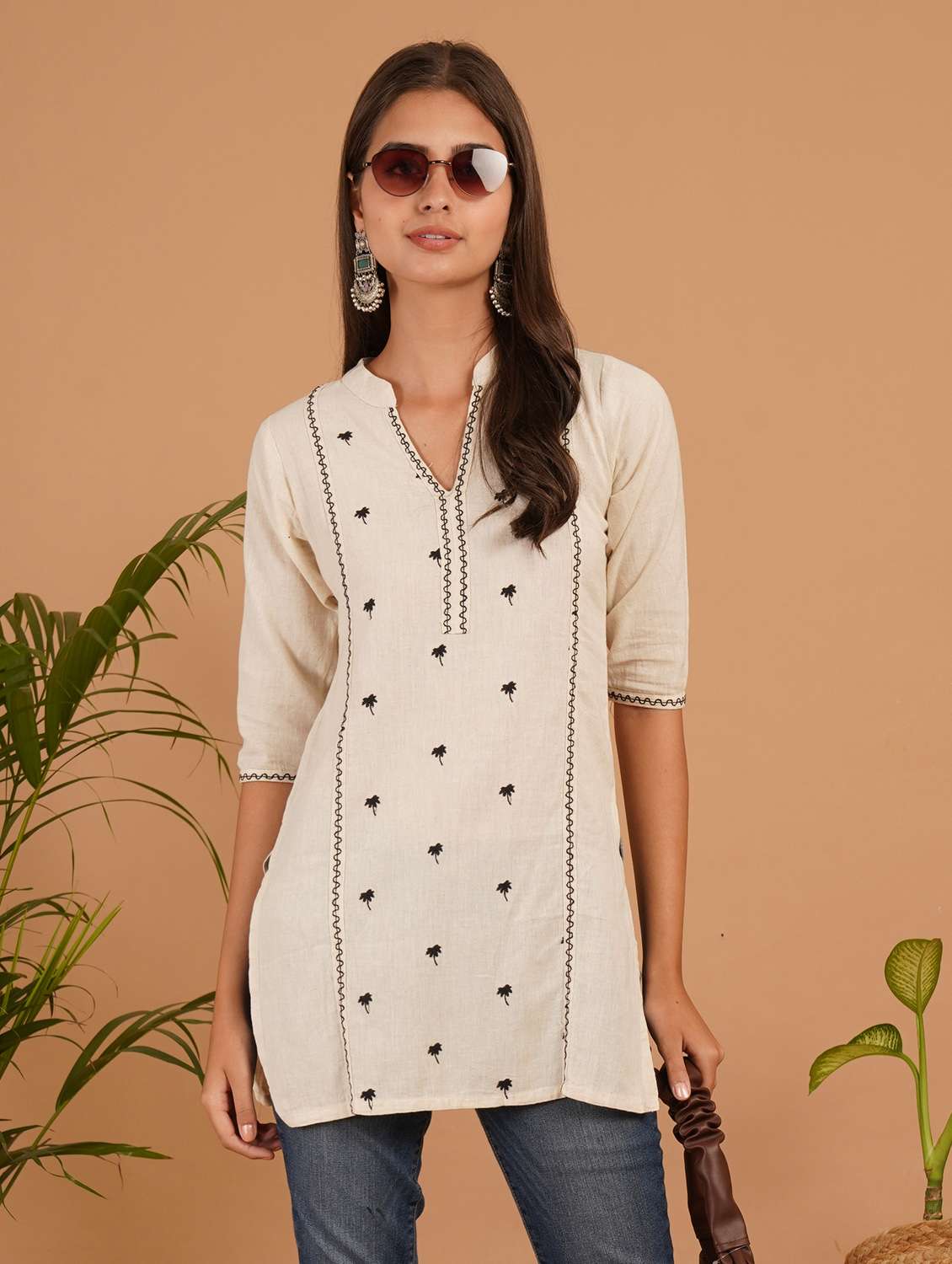 women embroidered three quarter sleeve straight kurti