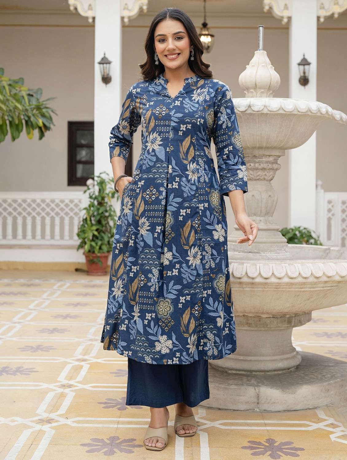 women printed three quarter sleeve kurta palazzo set