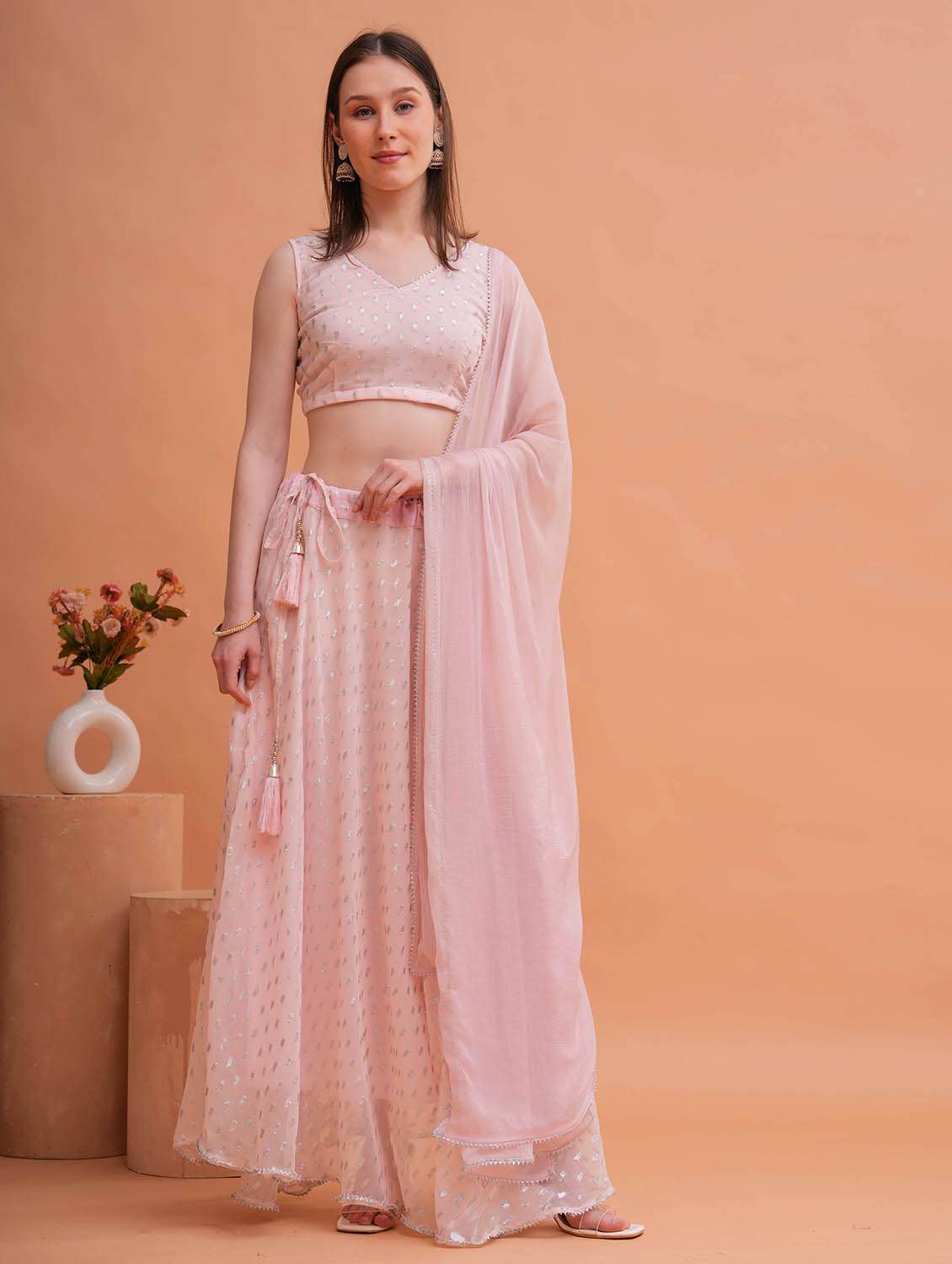 women self design stitched flared lehnga choli with dupatta set