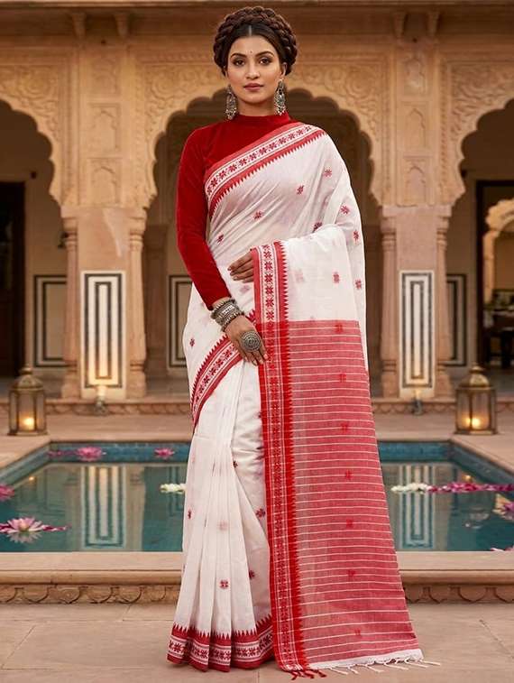 women self design handloom saree with blouse