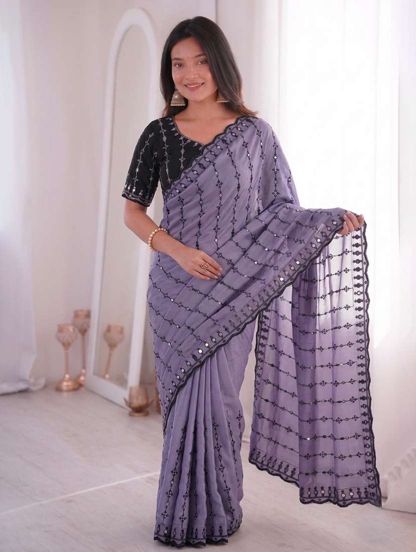 women solid with work embroidered saree with blouse