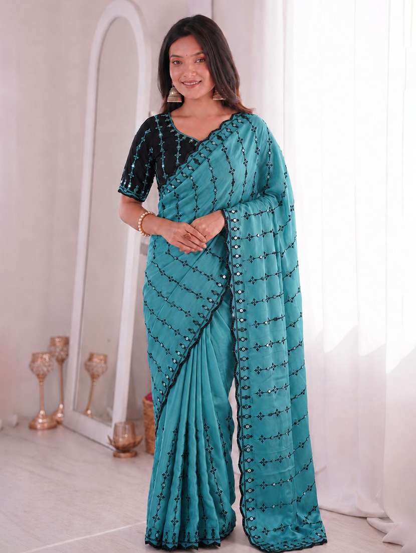 women solid with work embroidered saree with blouse