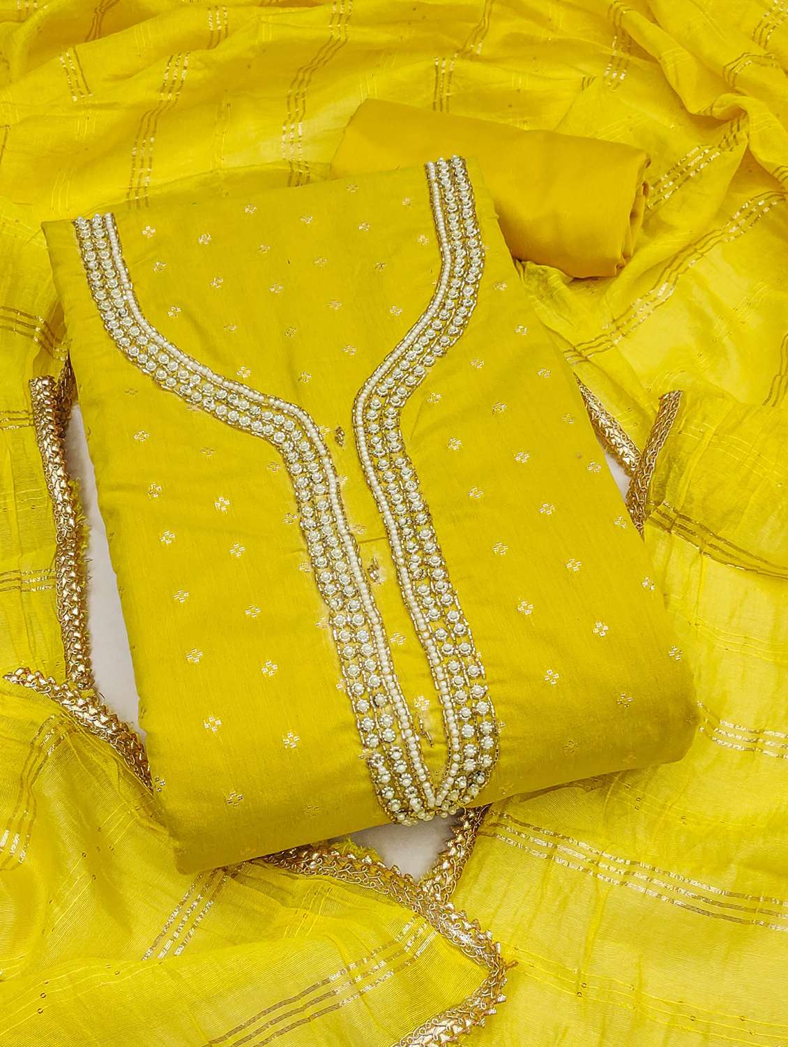 women self design unstitched suit set