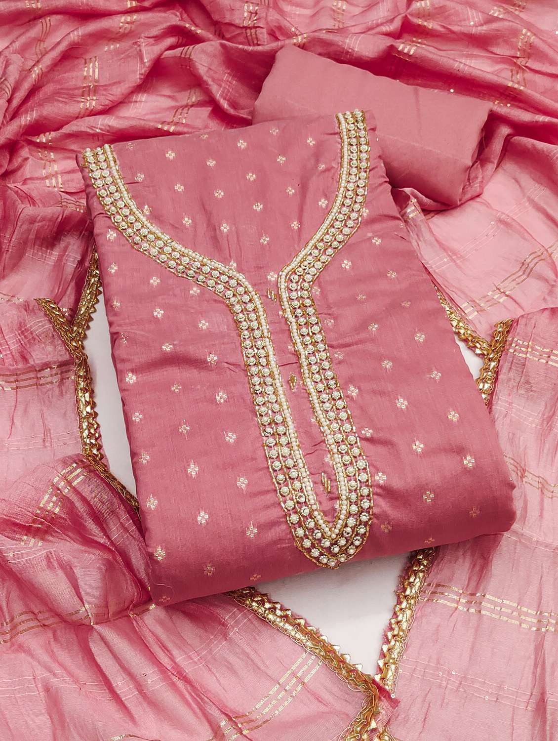 women self design unstitched suit set