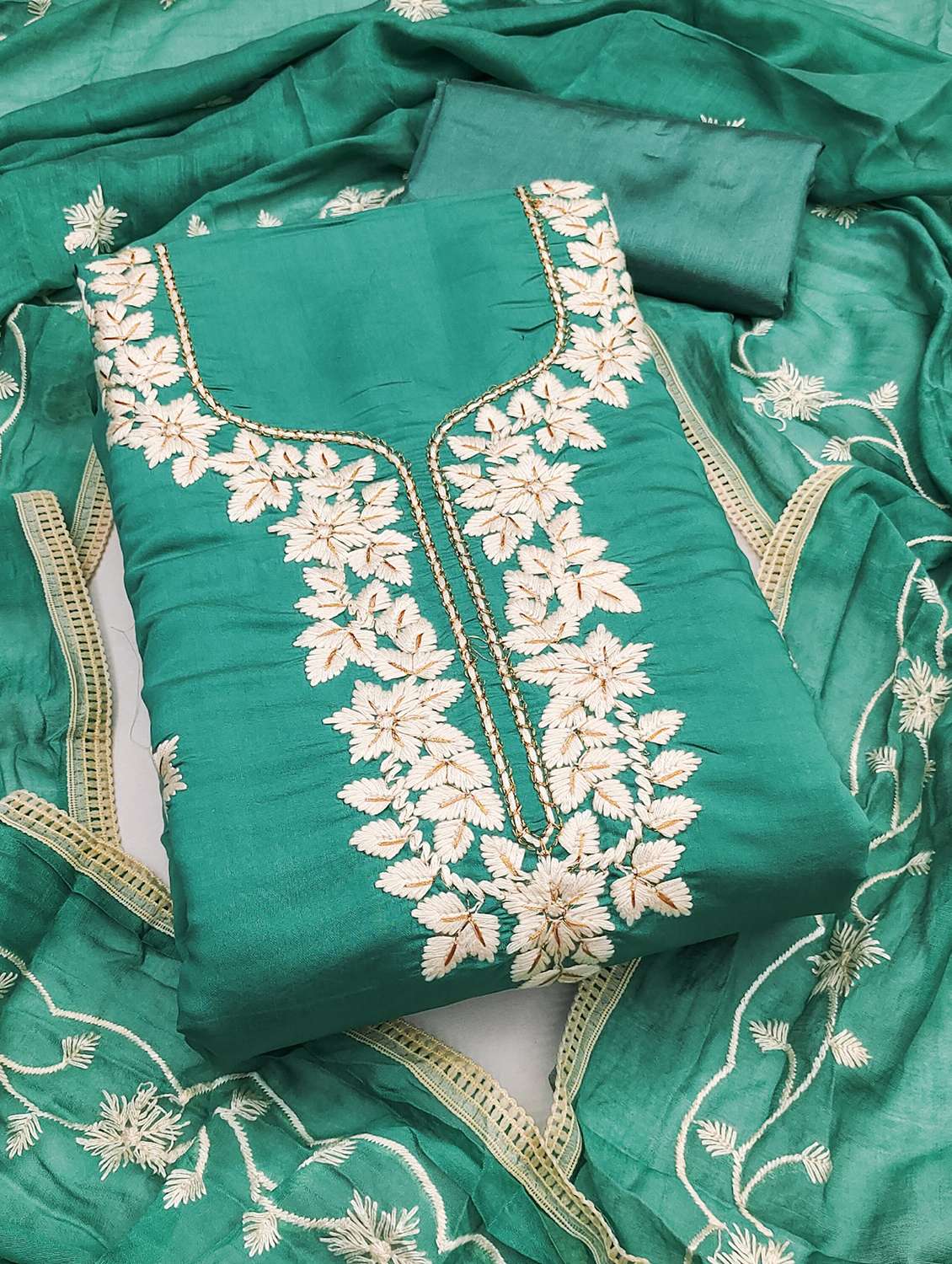 women embroidered unstitched suit set
