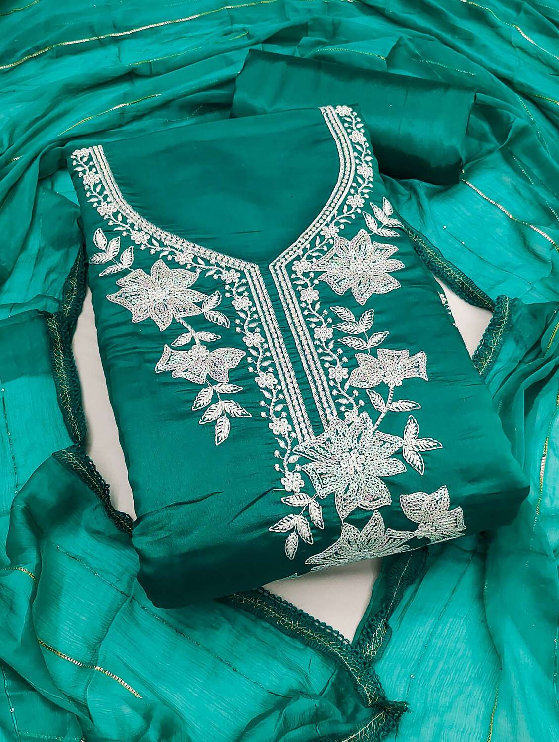 women embroidered unstitched suit set
