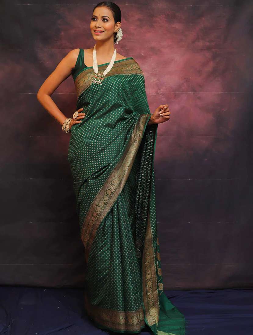 women self design banarasi saree with blouse