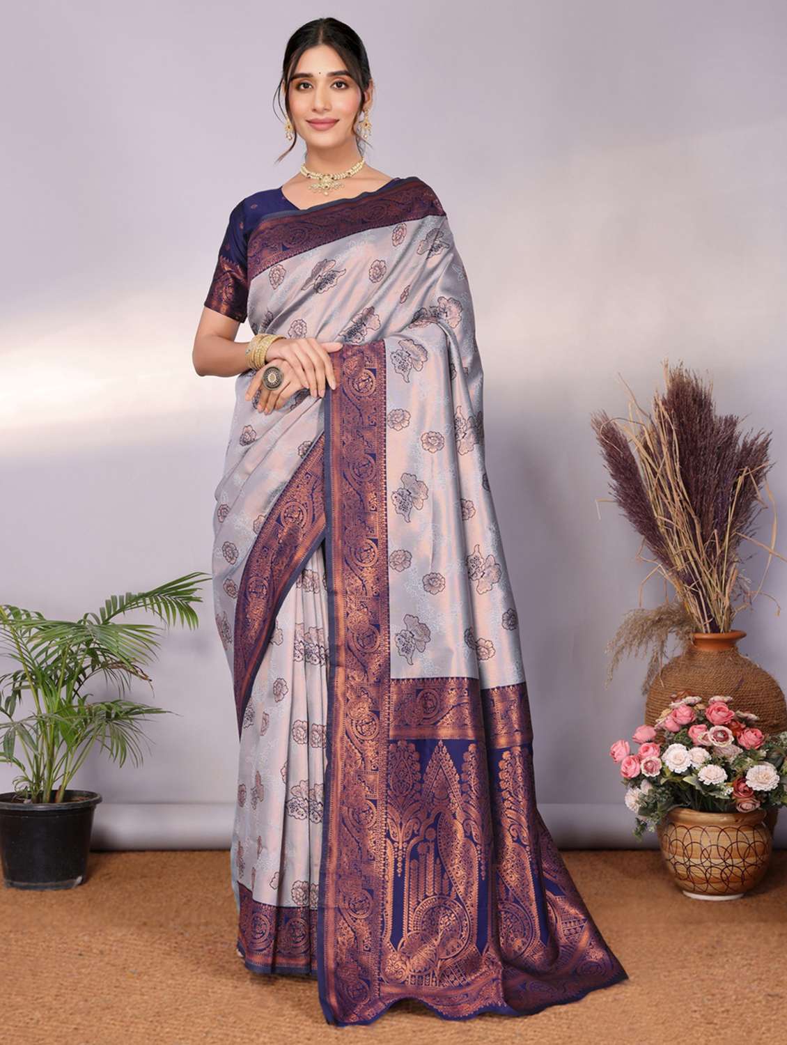 women self design banarasi saree with blouse