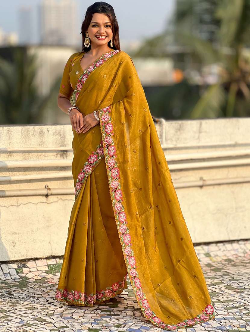 women solid with work embroidered saree with blouse