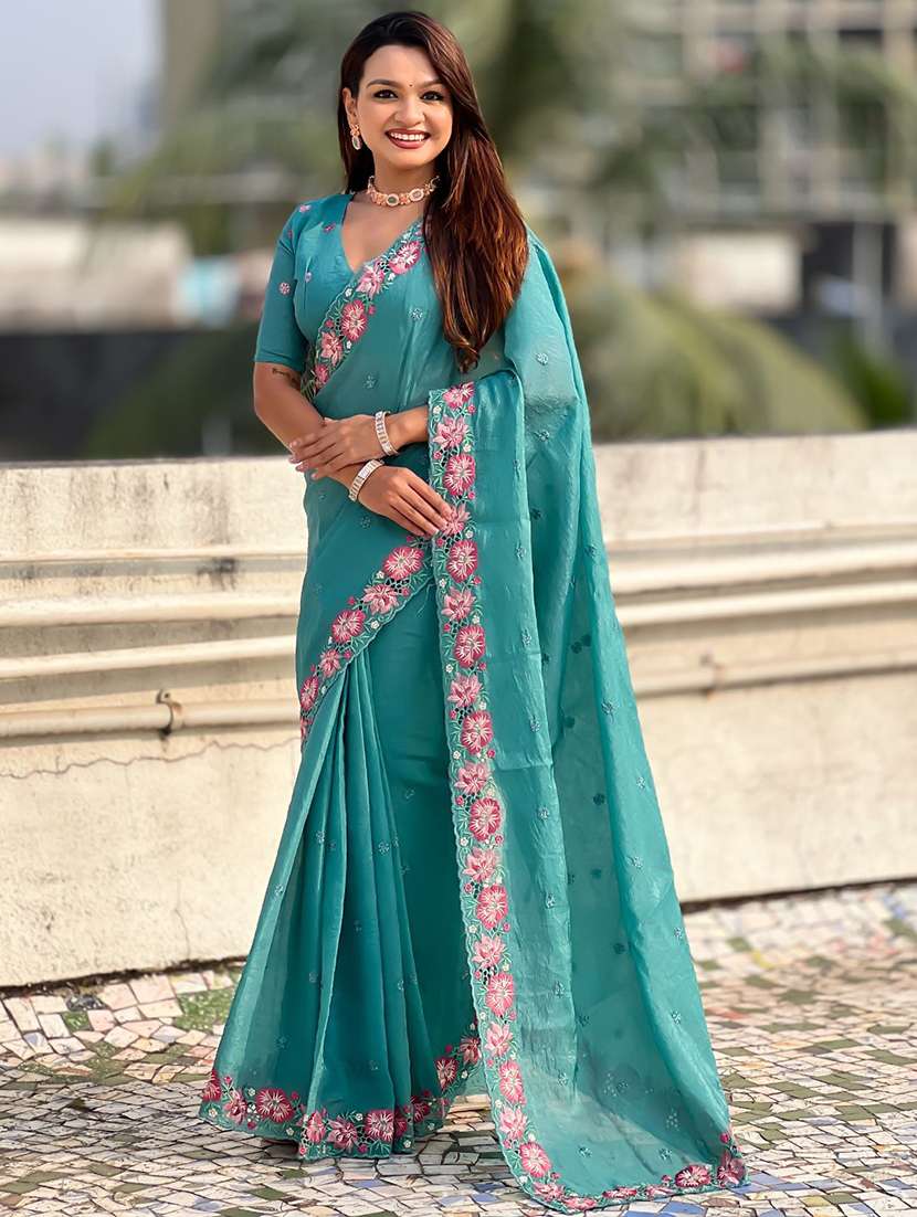 women solid with work embroidered saree with blouse