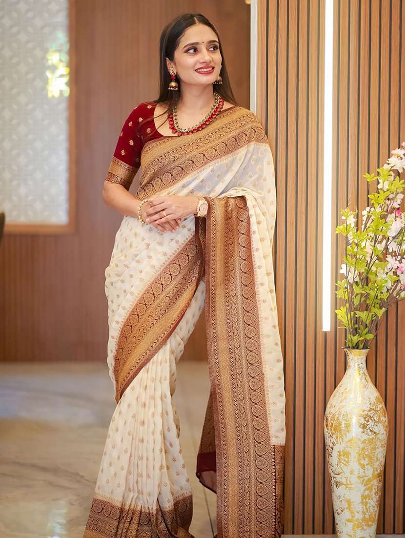 women self design banarasi saree with blouse