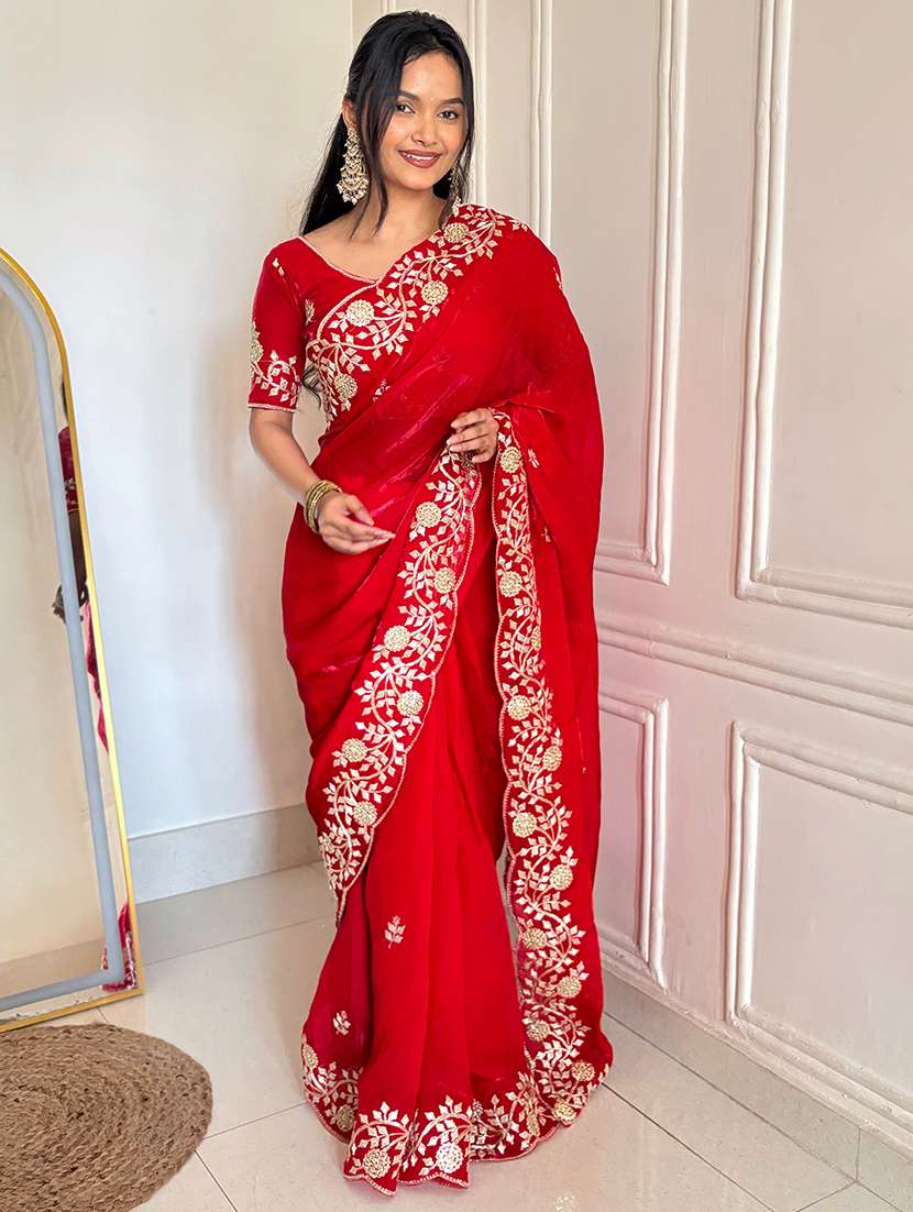 women solid with work embroidered saree with blouse
