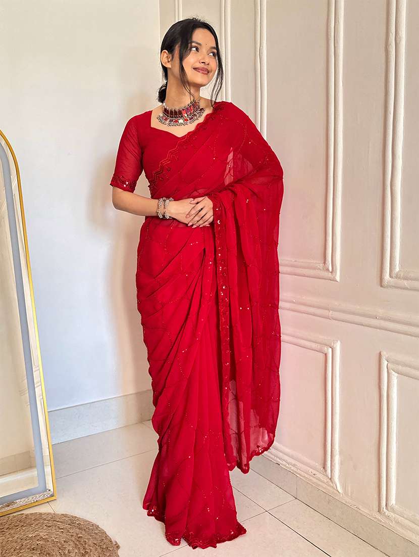 women solid with work embellished saree with blouse