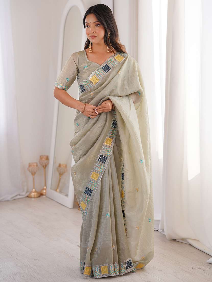 women solid with work embroidered saree with blouse