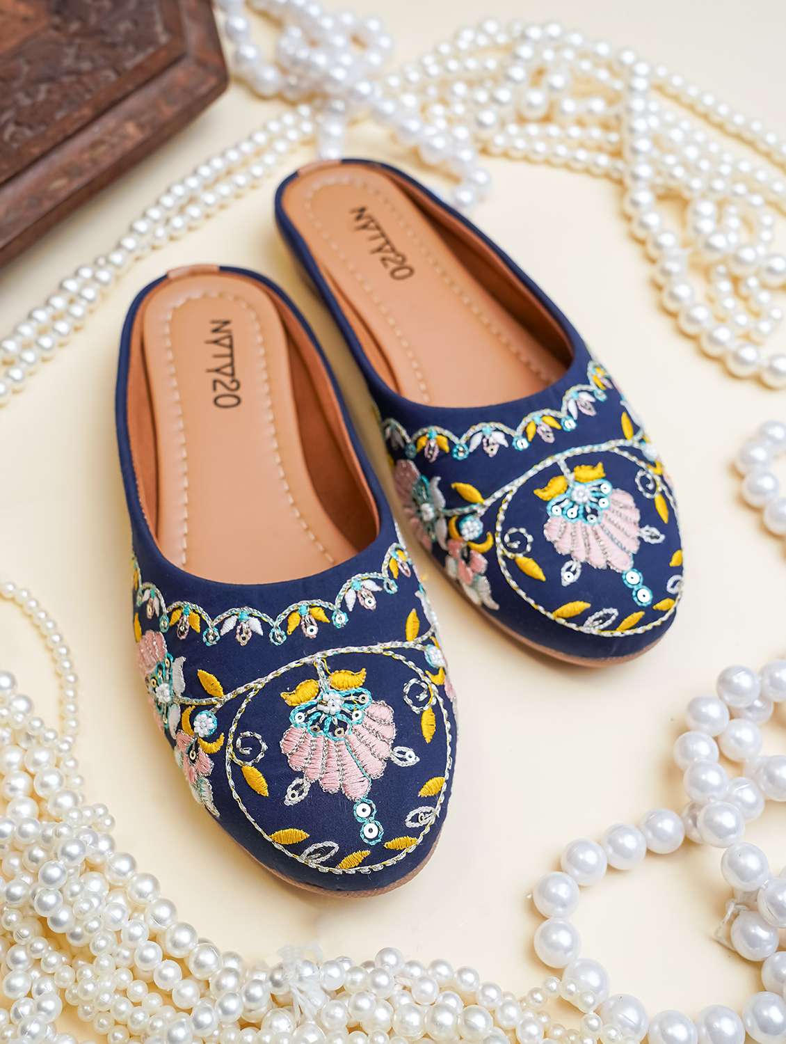 women embroidered slip on mules