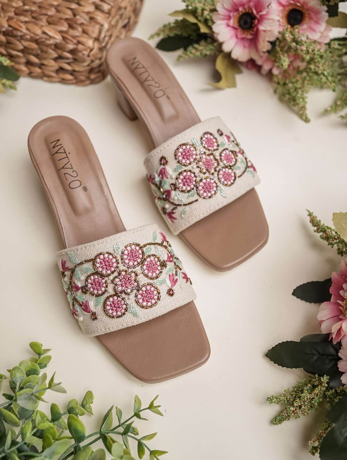 women embroidered slip on sandal