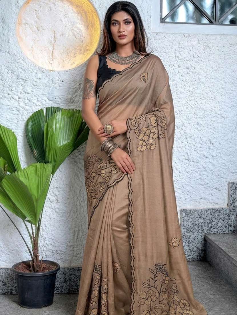 women solid with work embroidered saree with blouse