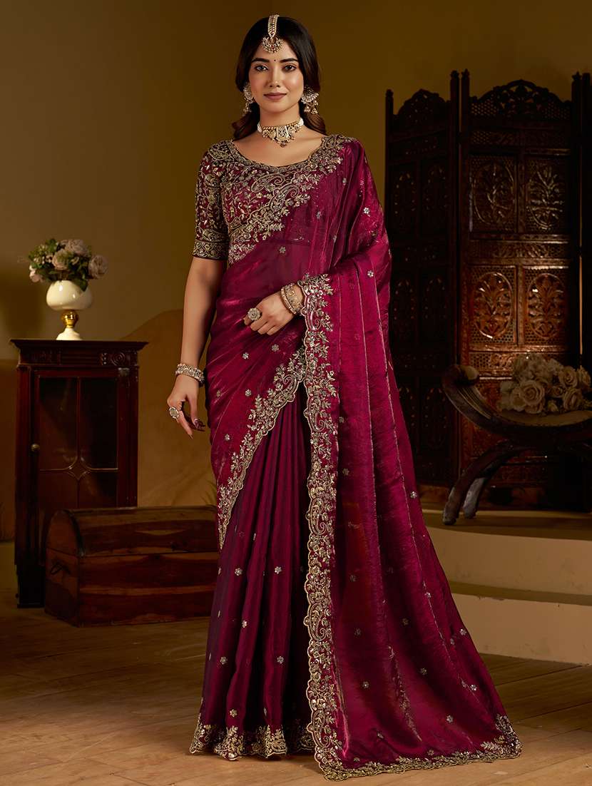 women solid with work embroidered saree with blouse