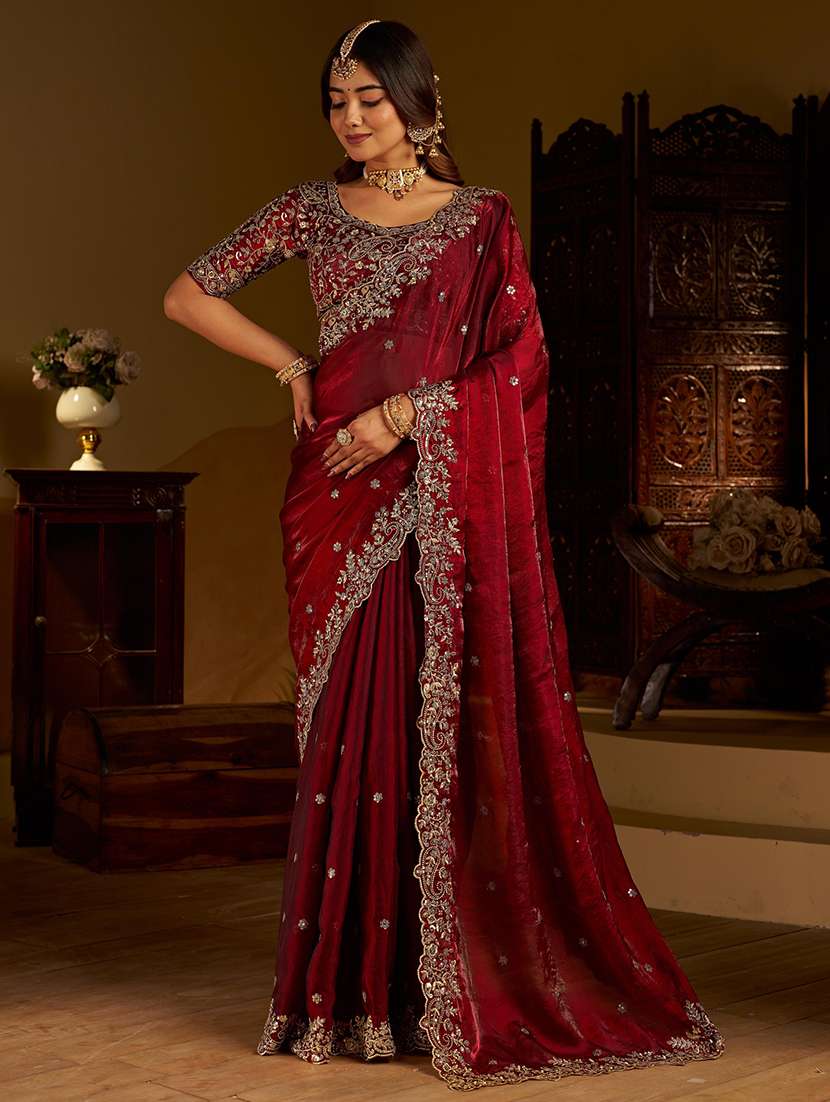 women solid with work embroidered saree with blouse