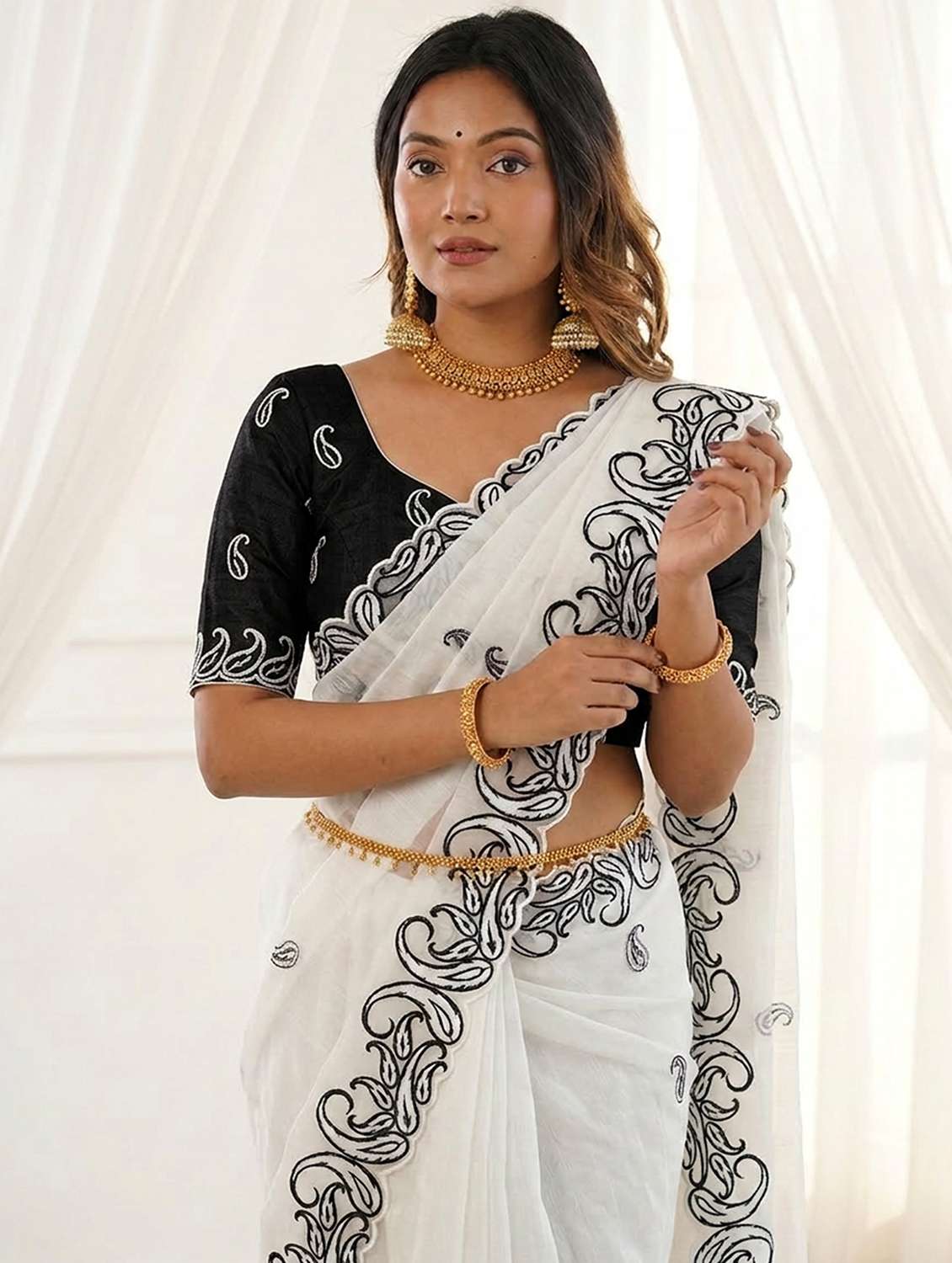 women solid with work embroidered saree with blouse