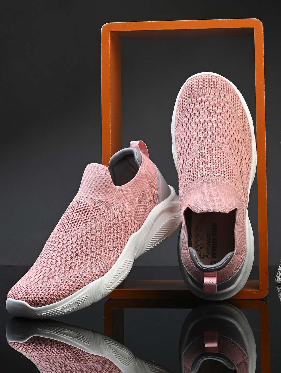 women textured slip on sports shoes