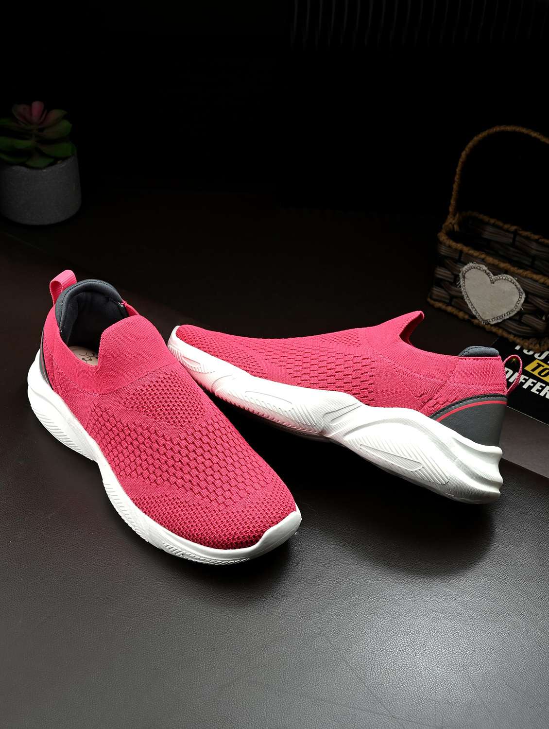 women textured slip on sports shoes