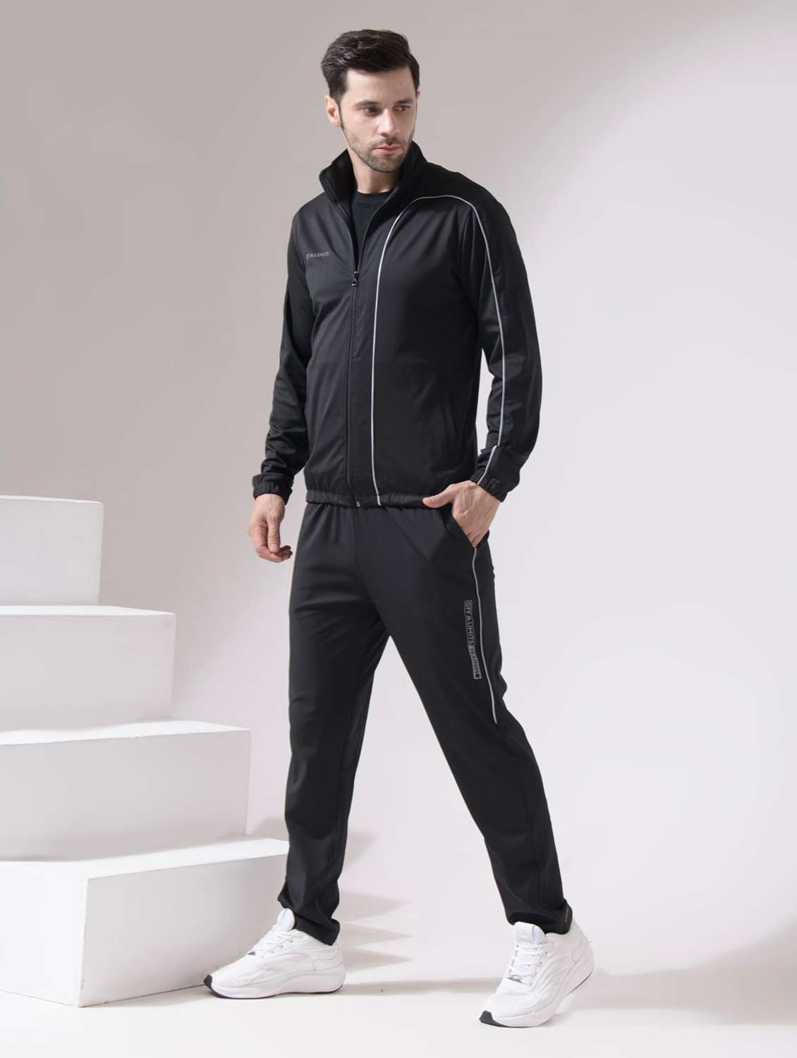 men taped long sleeves track suit