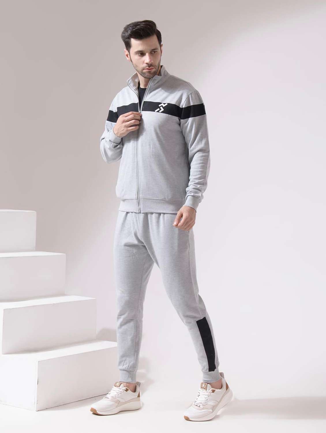 men taped long sleeves track suit