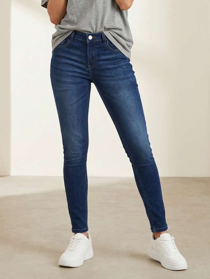 women washed mid rise skinny jeans