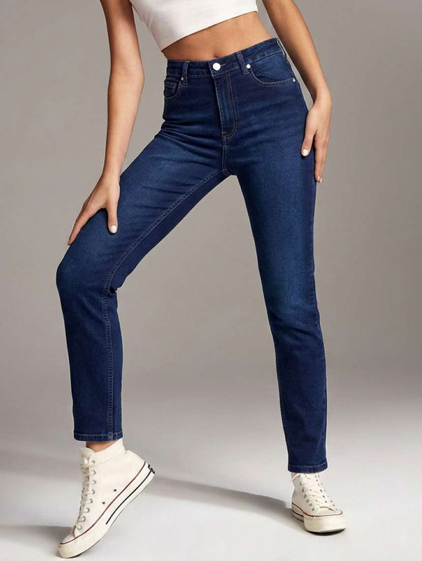women washed mid rise slim jeans