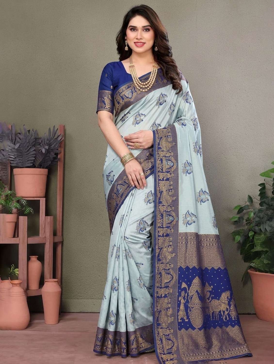 women self design banarasi saree with blouse