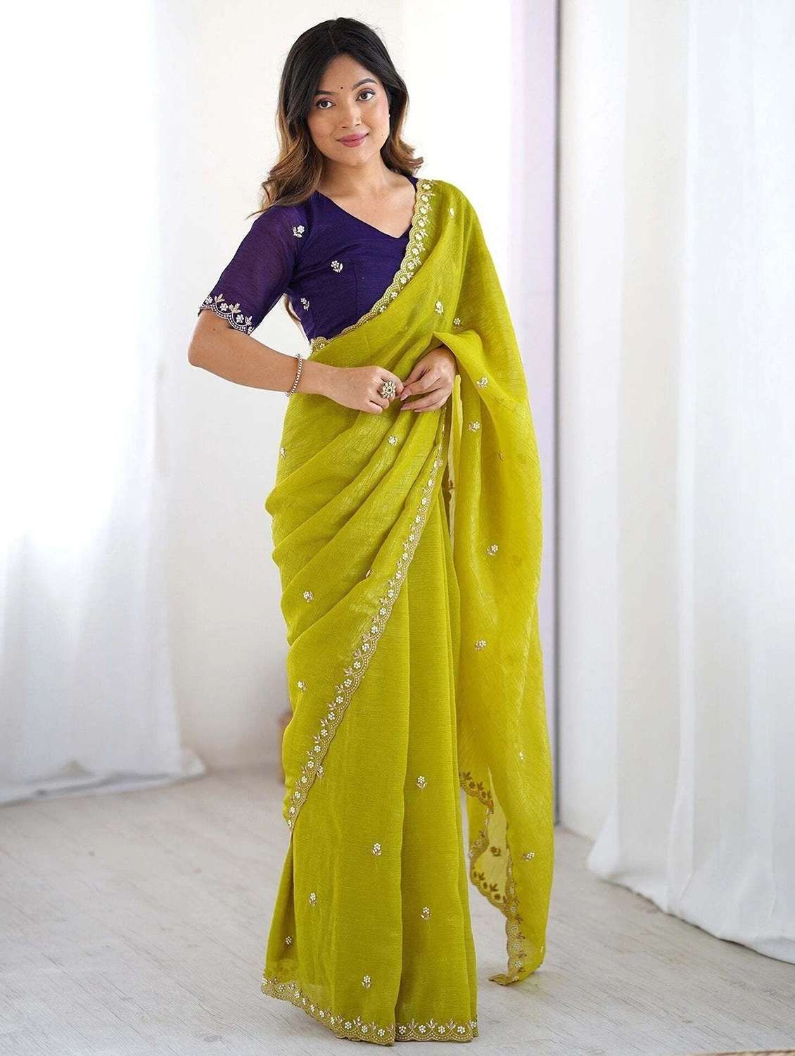 women solid with work embroidered saree with blouse