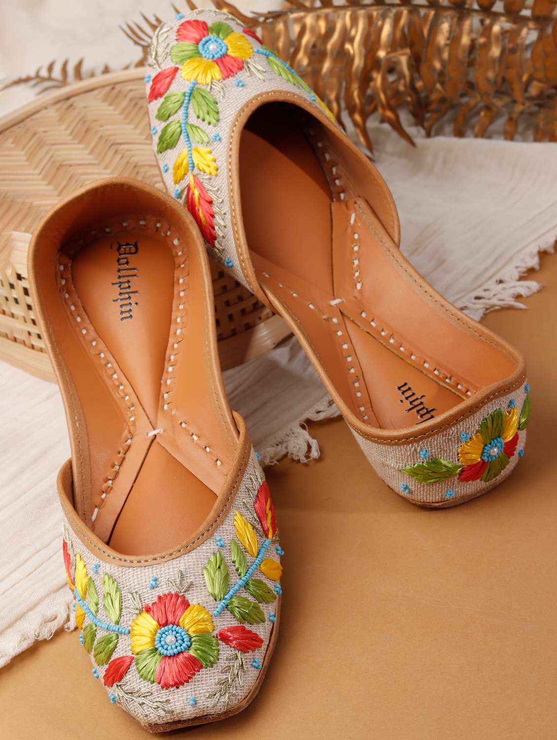 women embroidered slip on jutis