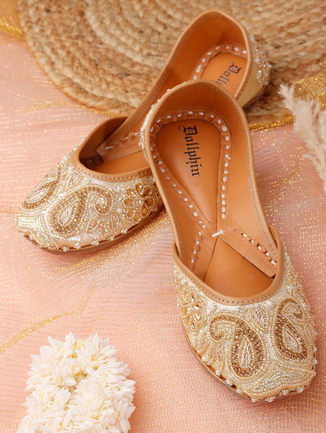 women embroidered slip on jutis