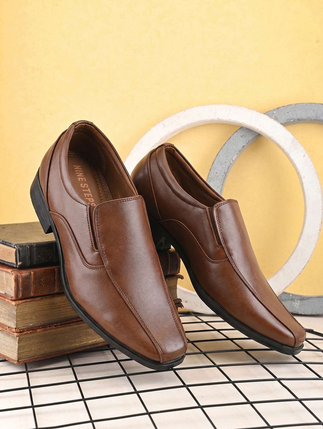 men solid slip on formal shoes