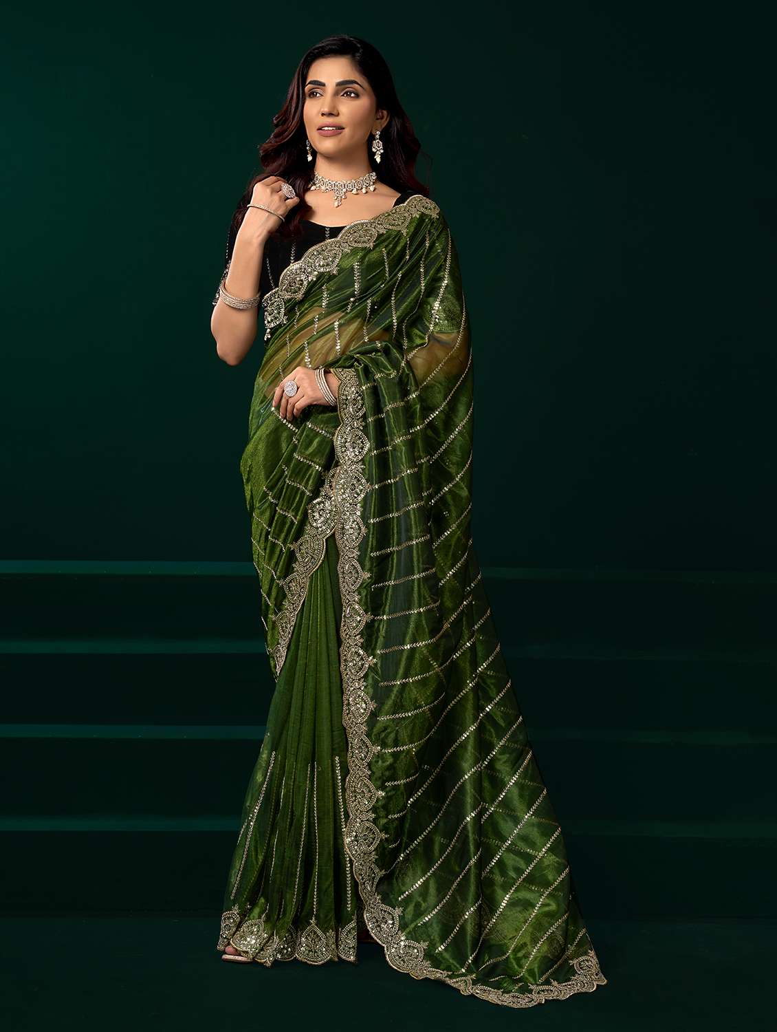 women solid with work embroidered saree with blouse