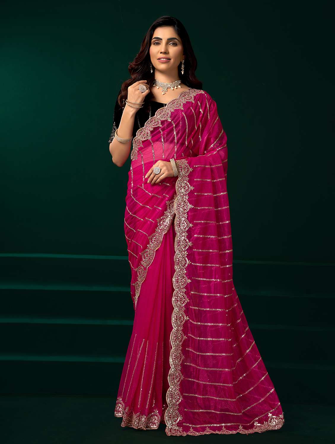 women solid with work embroidered saree with blouse