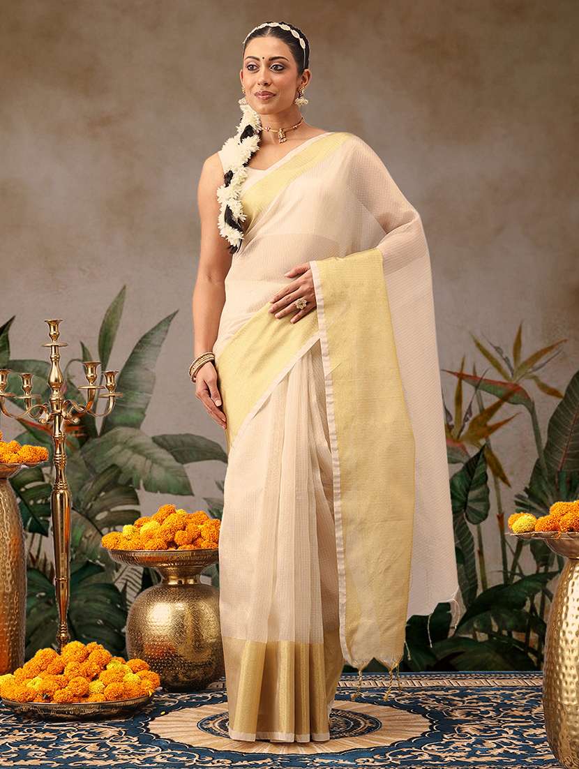 women solid with bordered kasavu saree with blouse