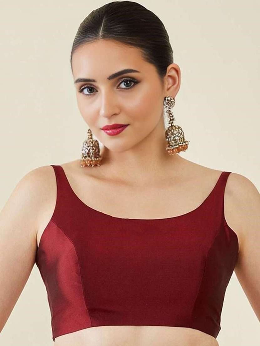 women solid sleeveless stitched blouse